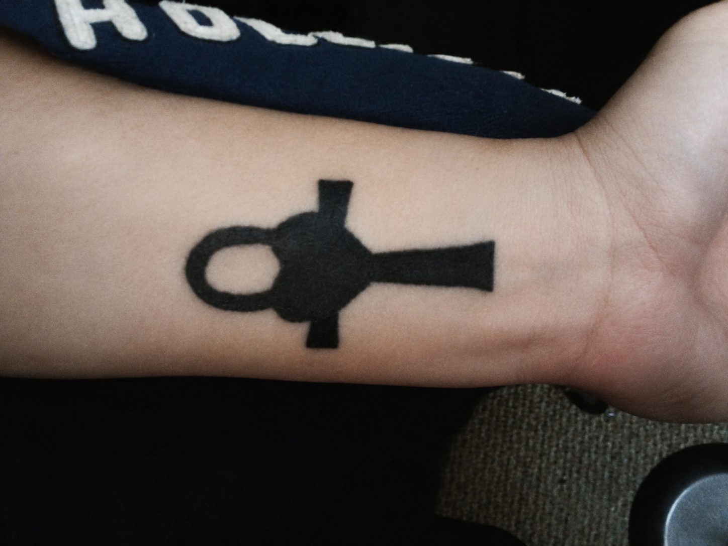 Customer's tattoo of the RA Apparel mark